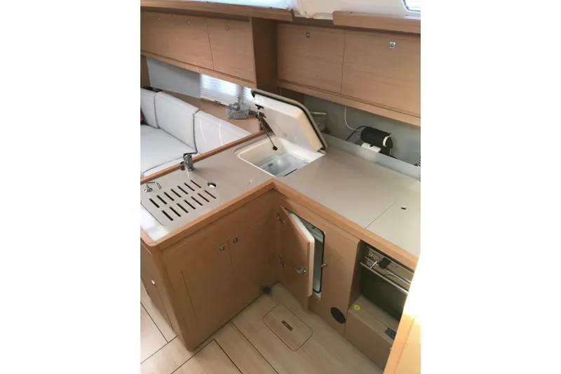  Yacht Photos Pics Modern kitchen interior of 2020 Dufour Yachts 390 Grand Large sailboat.