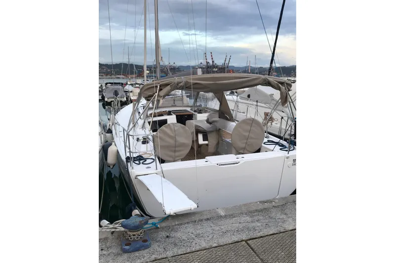  Yacht Photos Pics 2020 Dufour Yachts 390 Grand Large docked at marina, rear view.