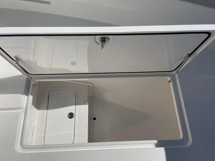 Deeper Yacht Photos Pics Open storage compartment on 2022 Invincible 39' Open Fisherman boat.