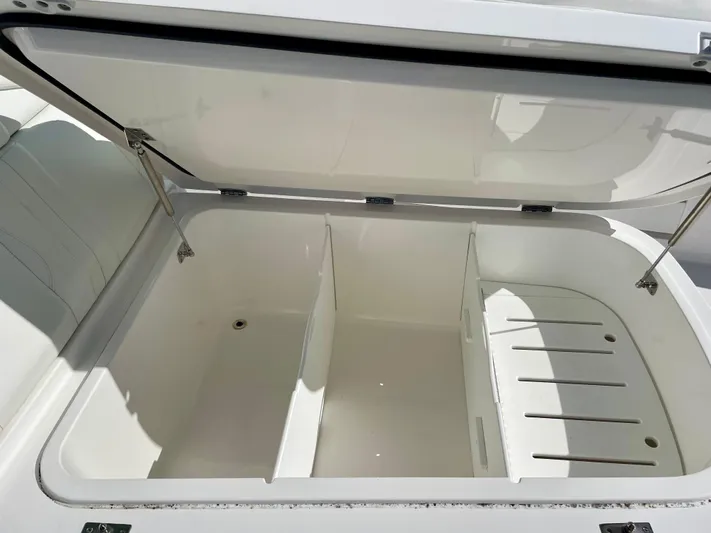 Deeper Yacht Photos Pics Open storage compartment on 2022 Invincible 39' Open Fisherman boat.