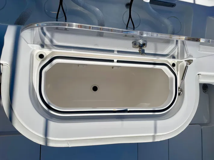 Deeper Yacht Photos Pics 2022 Invincible 39' Open Fisherman livewell detail, showcasing sleek design and functionality.