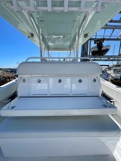 Deeper Yacht Photos Pics 2022 Invincible 39' Open Fisherman boat interior with storage compartments.