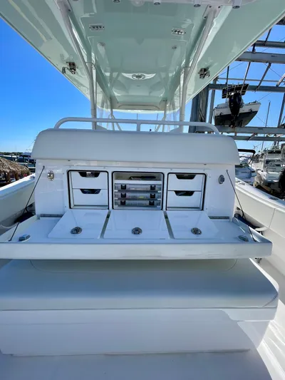 Deeper Yacht Photos Pics 2022 Invincible 39' Open Fisherman boat with storage compartments and sleek design.