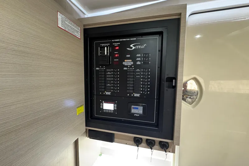  Yacht Photos Pics 2024 Scout 425 LXF electrical panel with controls and voltage meters.