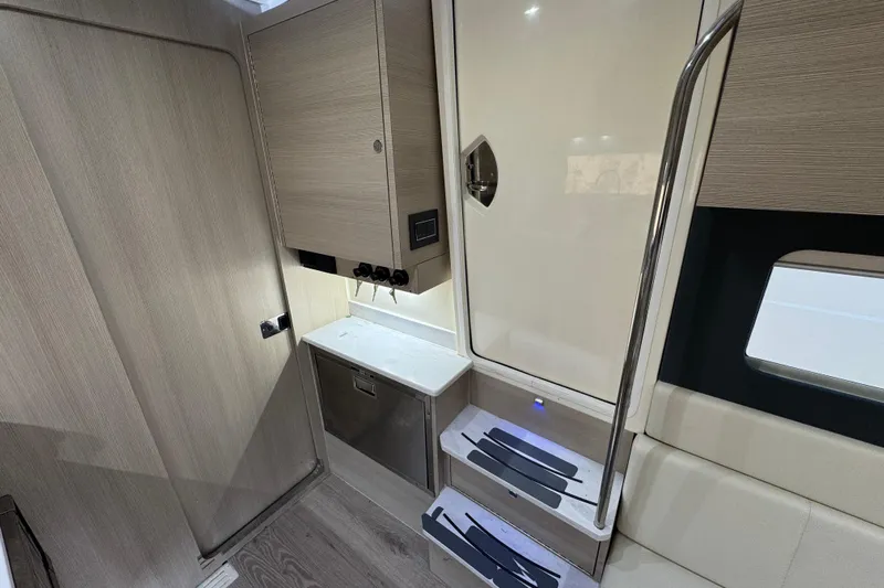  Yacht Photos Pics 2024 Scout 425 LXF interior with modern cabinetry and sleek design elements.