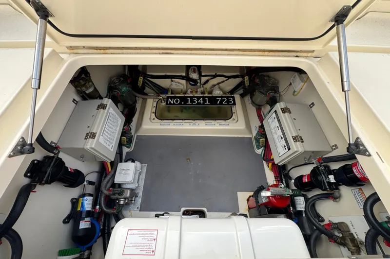  Yacht Photos Pics 2024 Scout 425 LXF engine compartment with wiring and components visible.