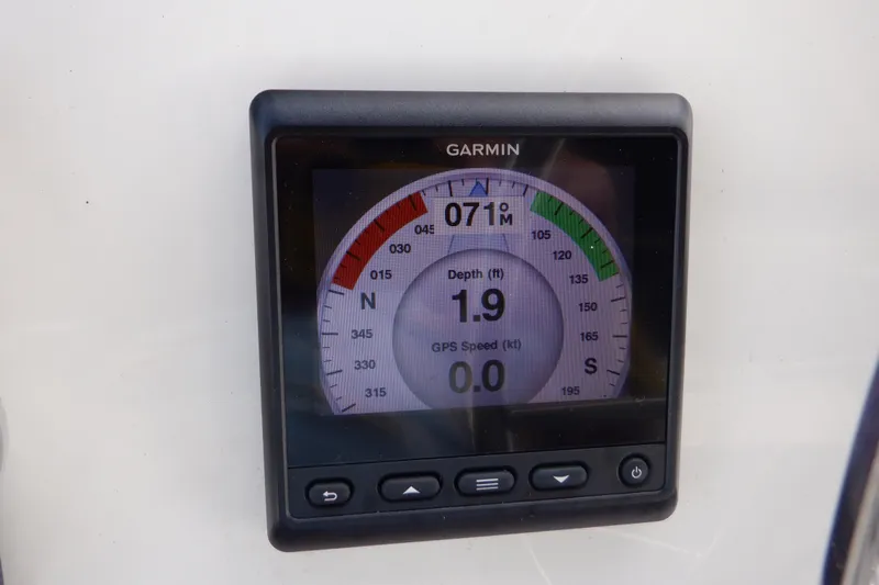 Epic Yacht Photos Pics Garmin display on 1998 Bayliner 4788 Pilot House Motoryacht showing depth and GPS speed.