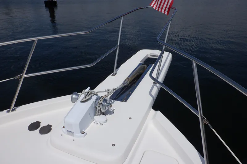 Epic Yacht Photos Pics Bow of 1998 Bayliner 4788 Pilot House Motoryacht with anchor and American flag.