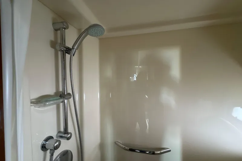 The Office Yacht Photos Pics Shower area in 2011 Sea Ray 470 Sundancer yacht, featuring modern fixtures.