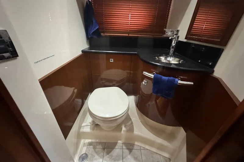 The Office Yacht Photos Pics Luxurious bathroom in 2011 Sea Ray 470 Sundancer yacht with modern fixtures.