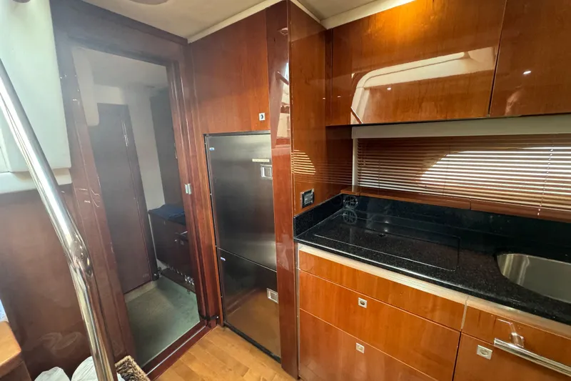 The Office Yacht Photos Pics Luxurious 2011 Sea Ray 470 Sundancer yacht interior with sleek kitchen design.