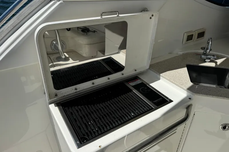The Office Yacht Photos Pics Outdoor grill and sink on 2011 Sea Ray 470 Sundancer yacht.