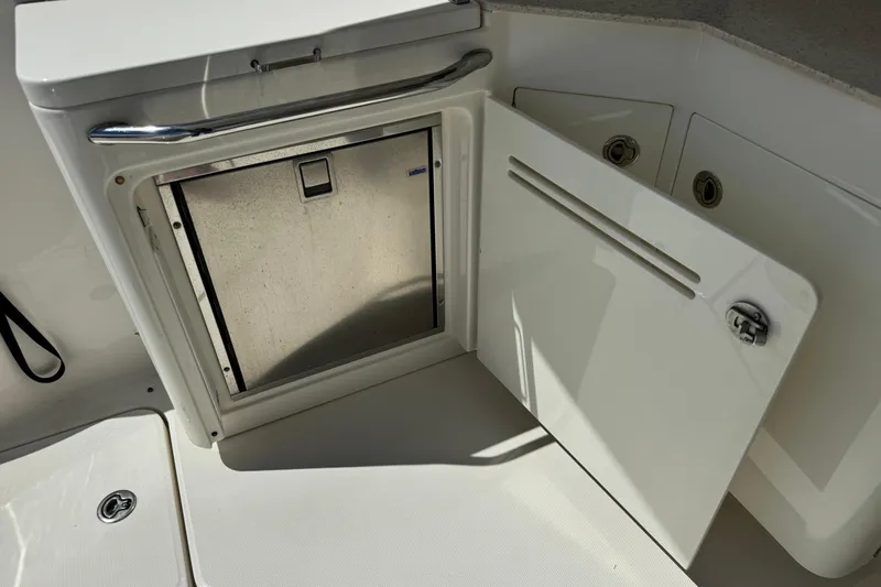 The Office Yacht Photos Pics Open storage compartment on 2011 Sea Ray 470 Sundancer yacht.