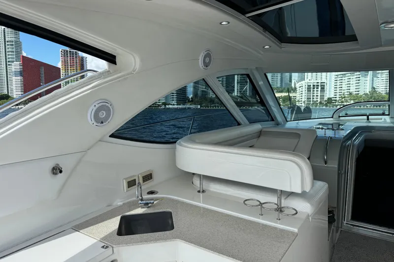 The Office Yacht Photos Pics Luxurious interior of 2011 Sea Ray 470 Sundancer yacht with city skyline view.