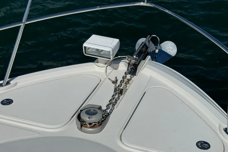 The Office Yacht Photos Pics Bow of 2011 Sea Ray 470 Sundancer with anchor and spotlight.