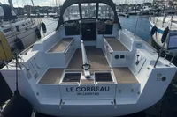 2022 Dufour 32 sailboat docked, featuring spacious cockpit and modern design.