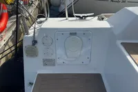 Dufour 32 sailboat deck, 2022 model, featuring utility connections and safety equipment.
