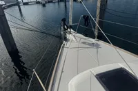 Bow view of 2022 Dufour 32 sailboat docked at marina.