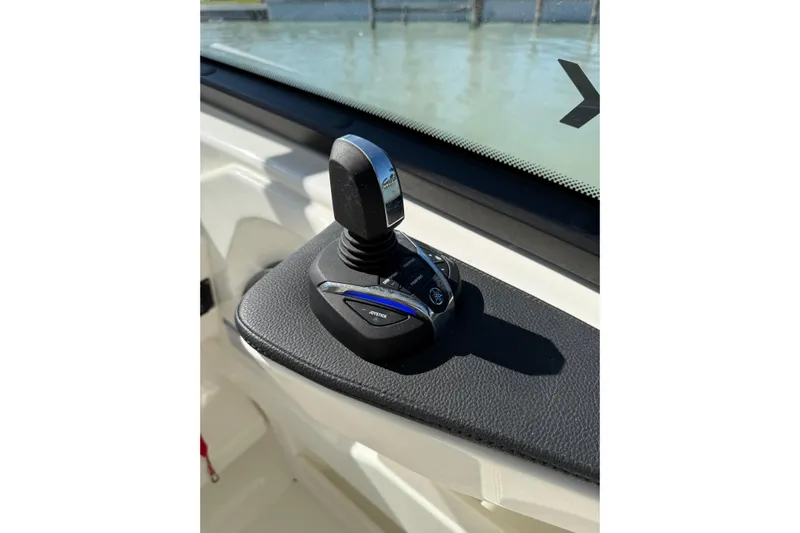  Yacht Photos Pics Joystick control on 2025 World Cat 260 DC-X boat dashboard, near water.