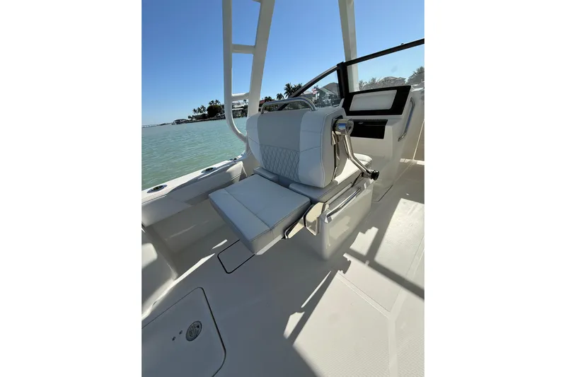  Yacht Photos Pics 2025 World Cat 260 DC-X boat interior with luxurious seating and modern design.