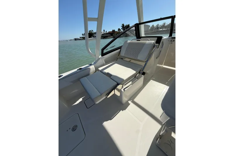  Yacht Photos Pics 2025 World Cat 260 DC-X boat interior with comfortable seating and ocean view.