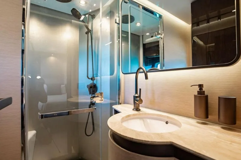 Lance West Yacht Photos Pics Luxurious bathroom interior of 2022 Azimut S10 yacht with modern fixtures and elegant design.