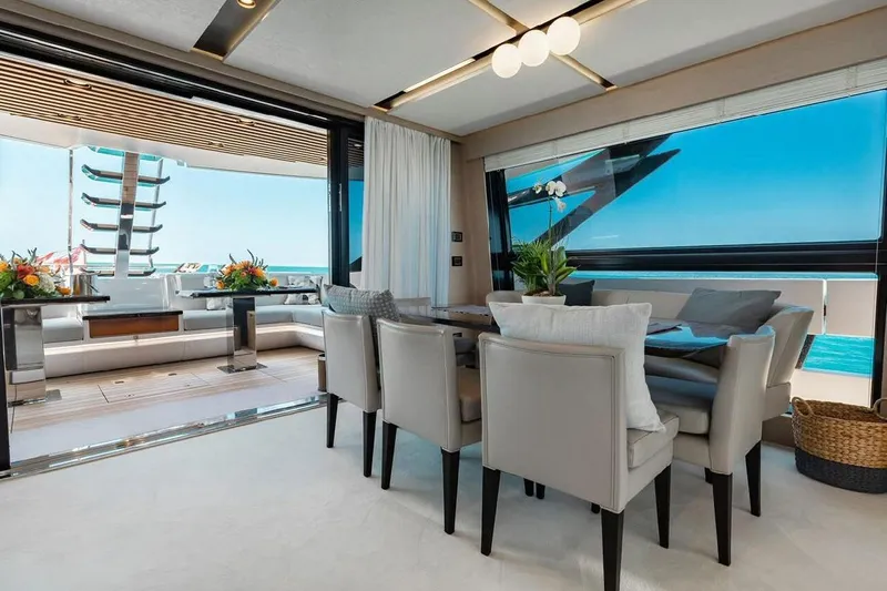 Lance West Yacht Photos Pics Luxurious interior of 2022 Azimut S10 yacht with elegant dining area and ocean view.