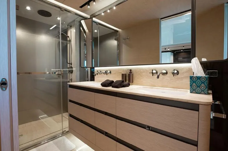 Lance West Yacht Photos Pics Luxurious bathroom in 2022 Azimut S10 yacht with modern fixtures and elegant design.