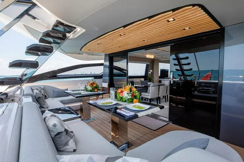 Lance West Yacht Photos Pics Luxurious 2022 Azimut S10 yacht interior with elegant seating and dining area.