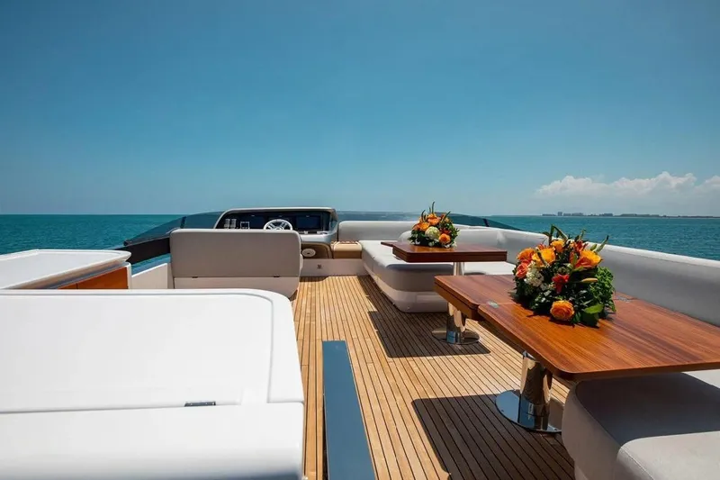 Lance West Yacht Photos Pics Luxurious 2022 Azimut S10 yacht deck with elegant seating and floral arrangements.