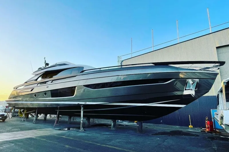 Lance West Yacht Photos Pics 2022 Azimut S10 yacht on dry dock, showcasing sleek design and modern features.