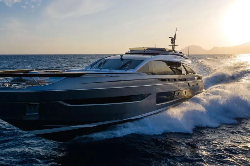 Lance West Yacht Photos Pics Luxury 2022 Azimut S10 yacht cruising at sunset on open sea.