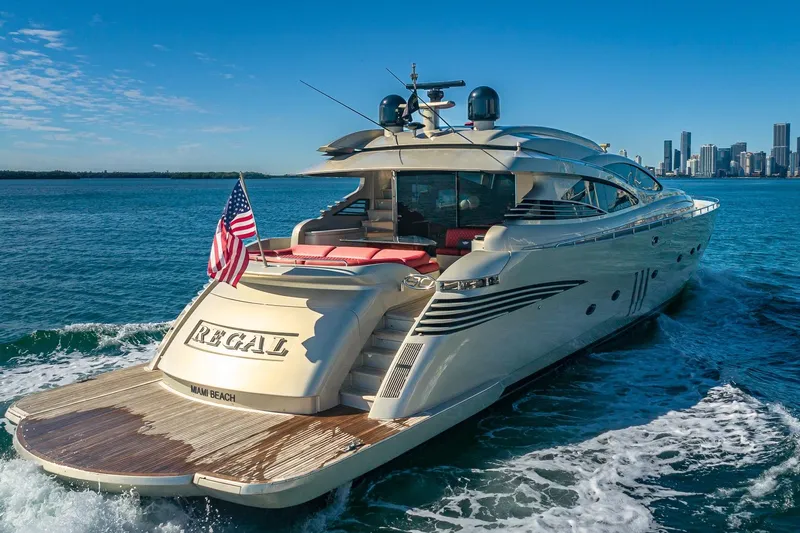 Regal Yacht Photos Pics Luxury 2008 Pershing 90 yacht cruising near Miami skyline.