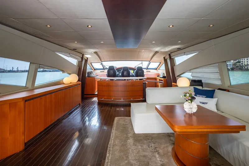 Regal Yacht Photos Pics Luxurious interior of 2008 Pershing 90 yacht with elegant wood finishes and modern design.