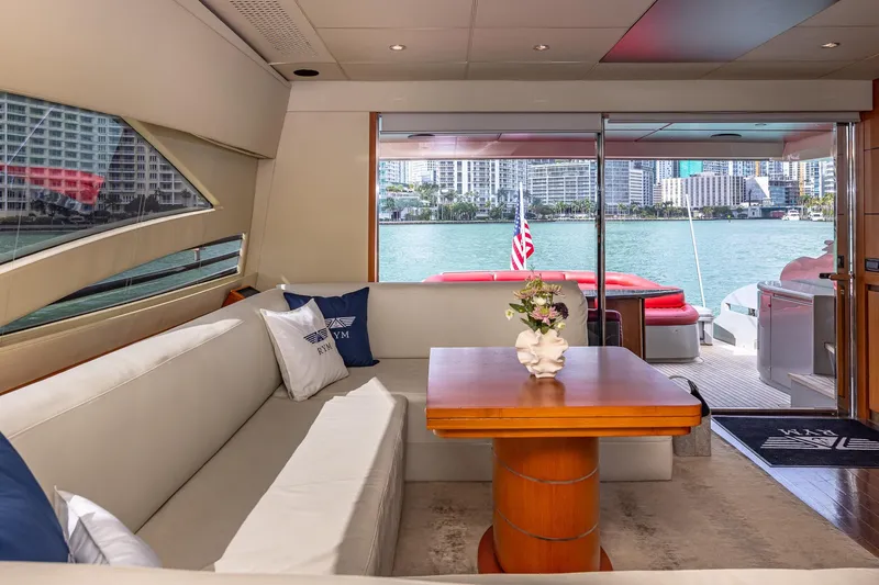 Regal Yacht Photos Pics Luxurious interior of 2008 Pershing 90 yacht with waterfront view and elegant seating area.