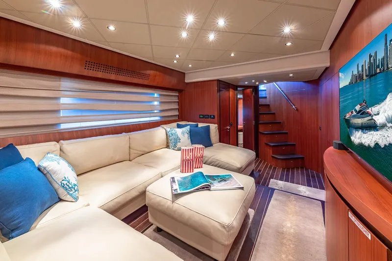 Regal Yacht Photos Pics Luxurious interior of 2008 Pershing 90 yacht with plush seating and modern decor.