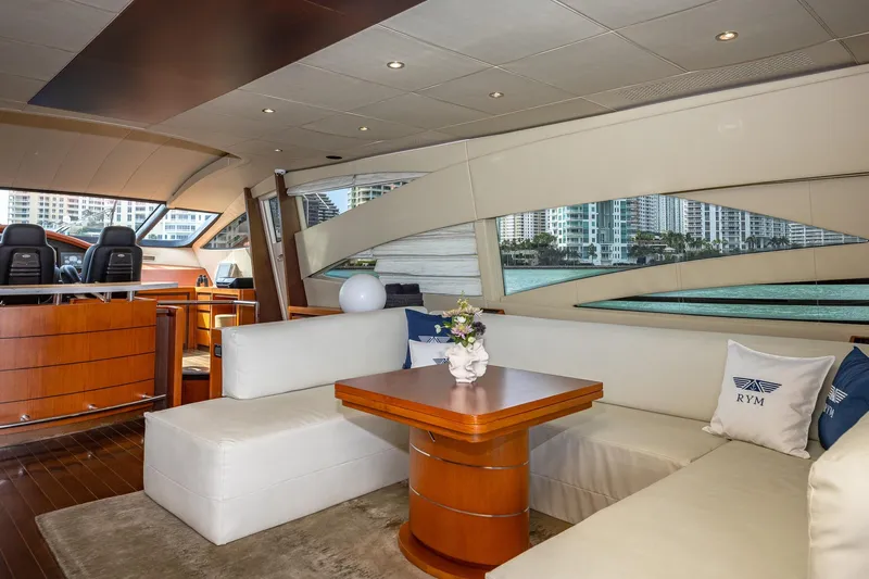 Regal Yacht Photos Pics Luxurious interior of 2008 Pershing 90 yacht with elegant seating and cityscape view.