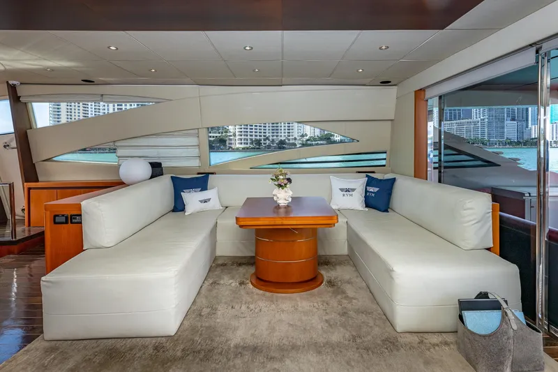 Regal Yacht Photos Pics Luxurious interior of 2008 Pershing 90 yacht with elegant seating and modern decor.