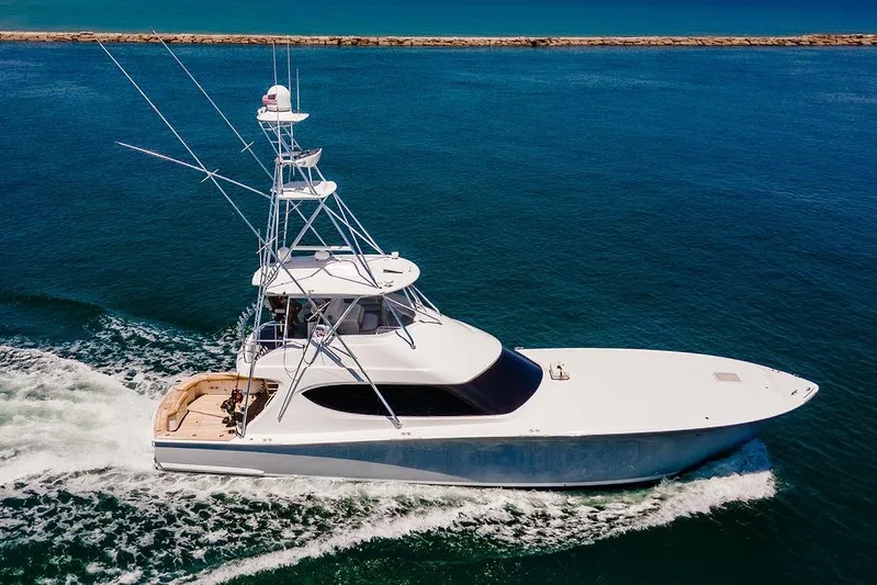 Sashimi Yacht Photos Pics 2014 Hatteras 63 GT yacht cruising on open water.