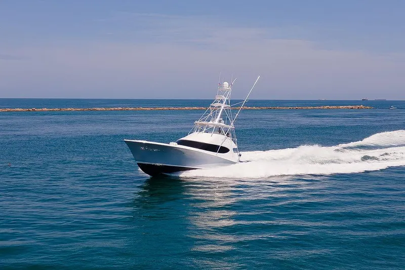 Sashimi Yacht Photos Pics 2014 Hatteras 63 GT yacht cruising on open water.