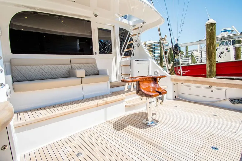 Sashimi Yacht Photos Pics Luxurious 2014 Hatteras 63 GT yacht deck with seating and fishing chair.