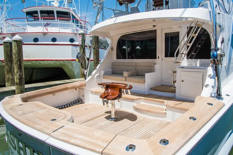 Sashimi Yacht Photos Pics Luxurious 2014 Hatteras 63 GT yacht with spacious deck and seating area.