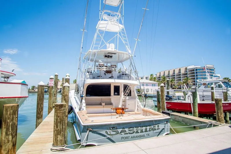 Sashimi Yacht Photos Pics 2014 Hatteras 63 GT yacht docked in sunny marina, Port Aransas, Texas.