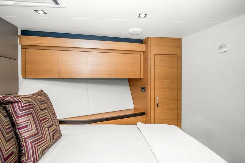 Sashimi Yacht Photos Pics Luxurious cabin interior of 2014 Hatteras 63 GT yacht with modern wood finishes.