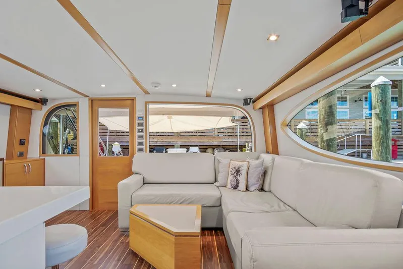 Sashimi Yacht Photos Pics Luxurious interior of 2014 Hatteras 63 GT yacht with modern furnishings.