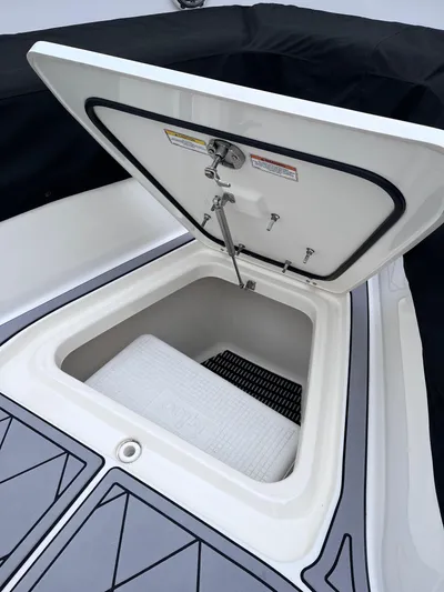  Yacht Photos Pics 2018 Boston Whaler 350 Outrage storage compartment with open hatch.