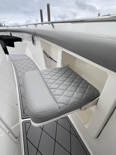  Yacht Photos Pics 2018 Boston Whaler 350 Outrage interior with quilted seat and sleek design.