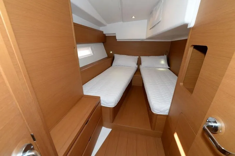  Yacht Photos Pics Interior cabin of 2019 Grand Soleil 48 Performance yacht with twin beds.