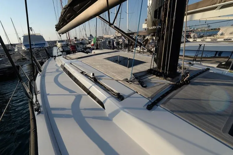  Yacht Photos Pics 2019 Grand Soleil 48 Performance yacht deck at marina, showcasing sleek design and rigging.