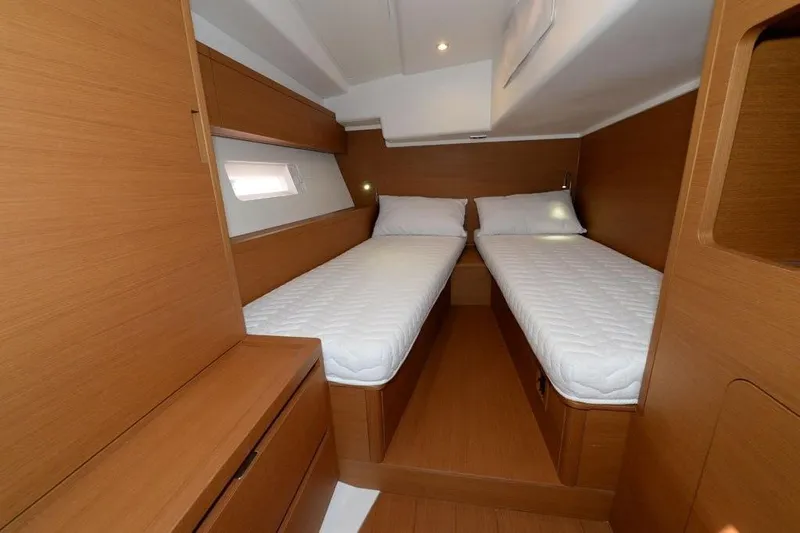  Yacht Photos Pics Interior cabin of 2019 Grand Soleil 48 Performance yacht with twin beds.